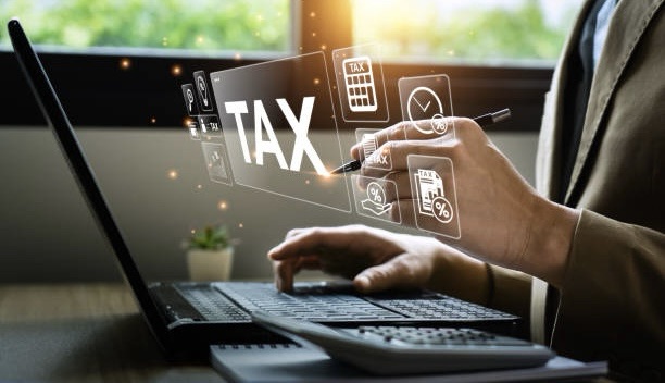 Tax deduction planning concept. Businessman calculating business balance prepare tax reduction. taxes paid by individuals and corporations such as VAT, income tax and property tax.