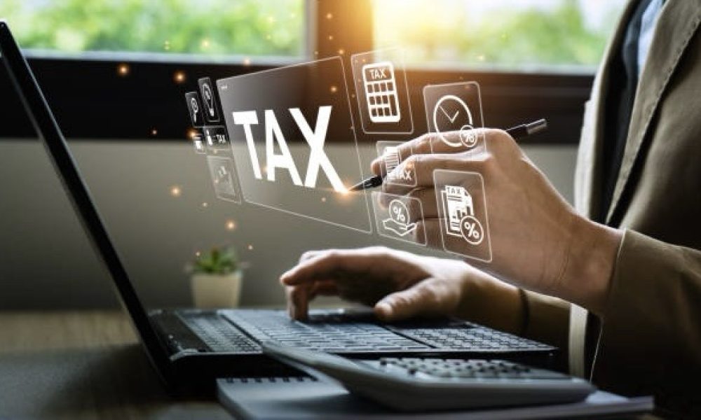 Tax deduction planning concept. Businessman calculating business balance prepare tax reduction. taxes paid by individuals and corporations such as VAT, income tax and property tax.